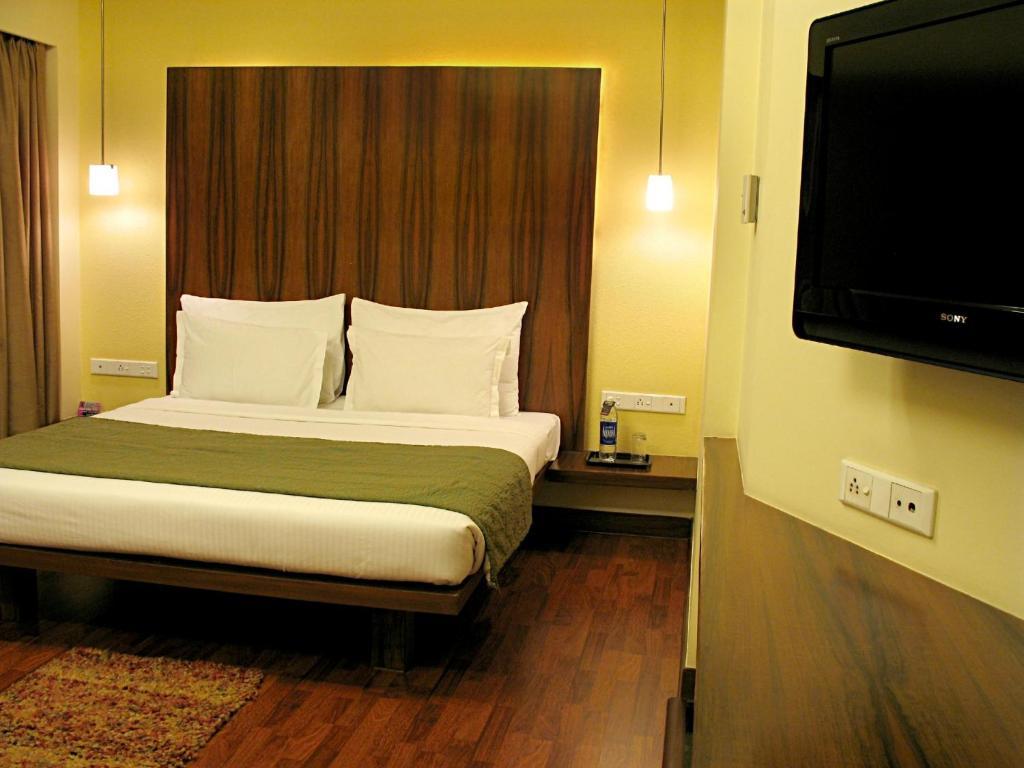 Hotel Studio Estique Púna Pokoj fotografie