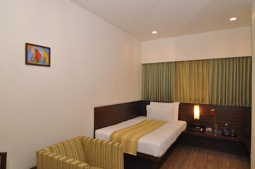 Hotel Studio Estique Púna Pokoj fotografie